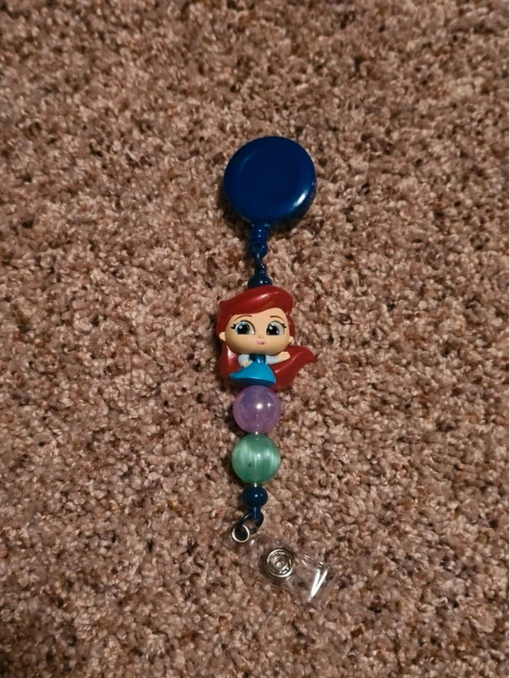 Ariel Doorables Badge Reel
